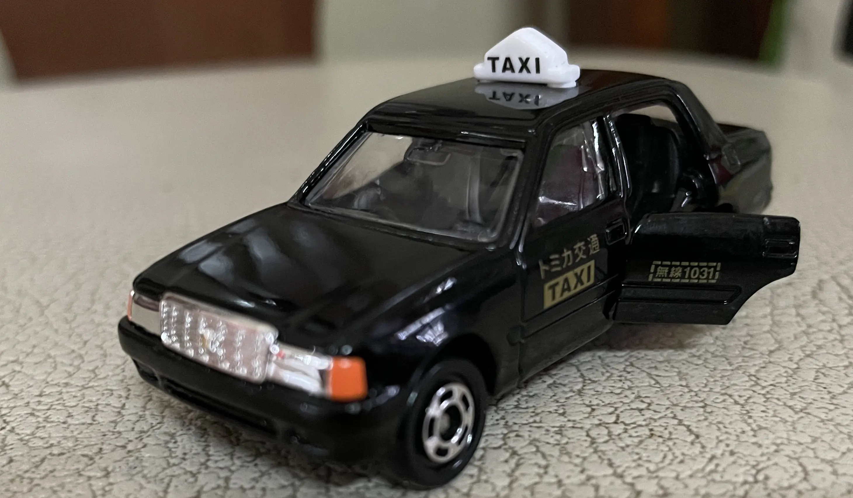 Die-cast model of a Japanese taxi